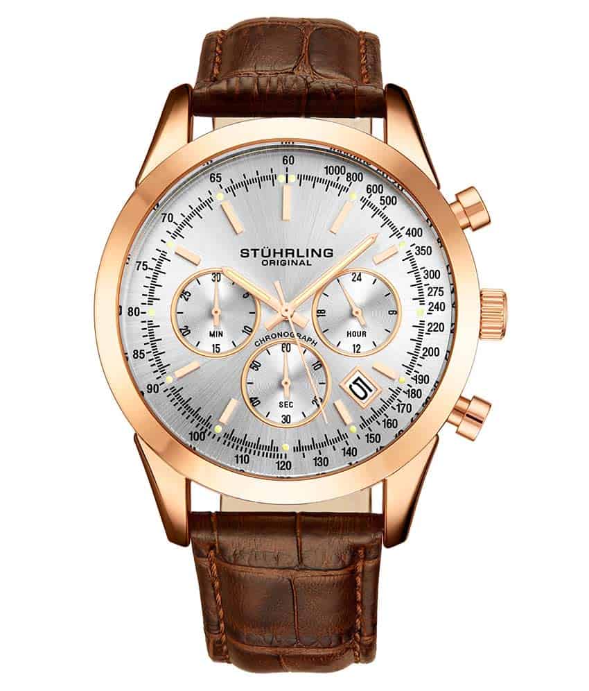 A Stühling watch with a rose gold case and a brown alligator embossed leather strap, featuring a silver dial and rose gold hands.